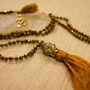 Gold Balinese Buddha necklace and bracelet with OM